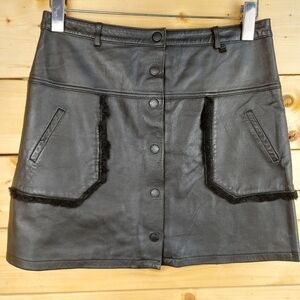 RUDSAK Black Leather Mini Skirt with Front Faux Pockets Shearling Fur Accents